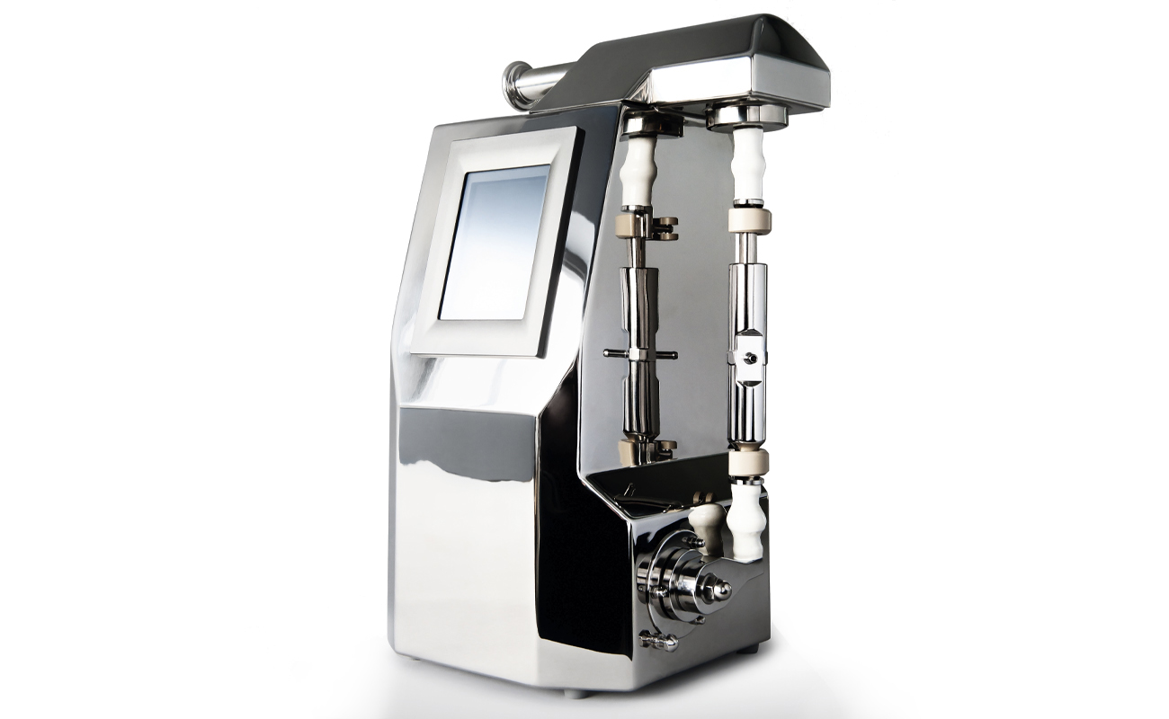 Máquina de llenado de sobremesa Malys para el llenado de viales, frascos y jeringas con fluidos de muy líquidos a muy viscosos.